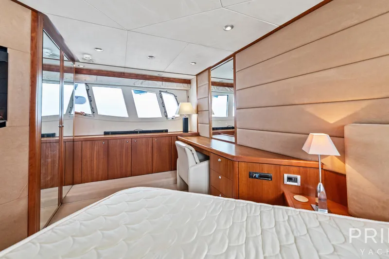  Yacht Photos Pics Luxurious interior of 2008 Sunseeker Manhattan 70 yacht with elegant wood finishes.