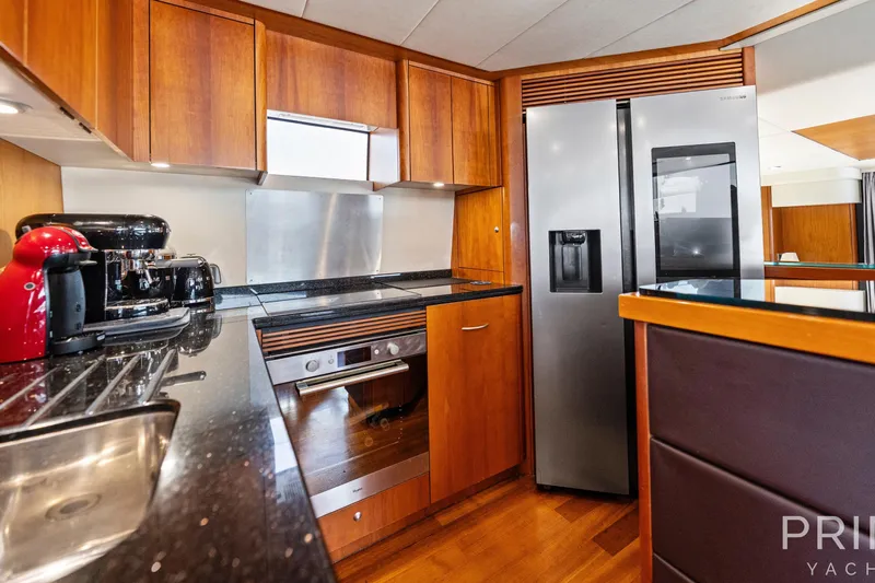  Yacht Photos Pics Luxurious kitchen interior of 2008 Sunseeker Manhattan 70 yacht with modern appliances.