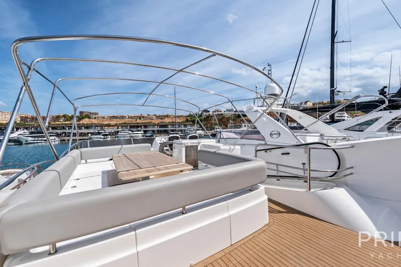  Yacht Photos Pics Luxurious 2008 Sunseeker Manhattan 70 yacht with spacious deck and elegant seating area.