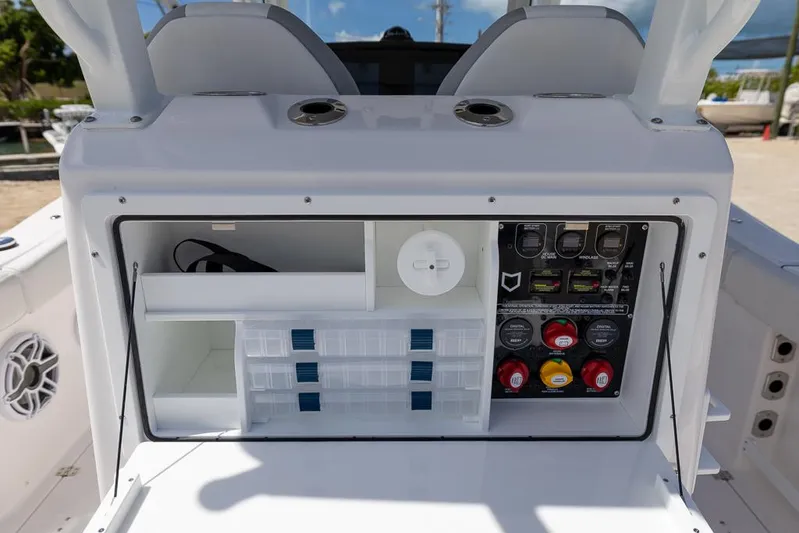  Yacht Photos Pics 2026 Sea Fox 288 Commander boat console with storage compartments and control panel.