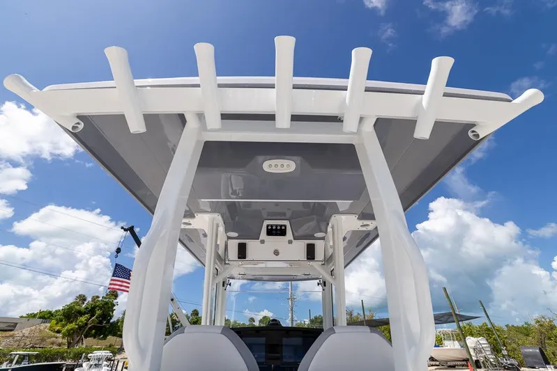  Yacht Photos Pics 2026 Sea Fox 288 Commander boat with T-top under a clear blue sky.