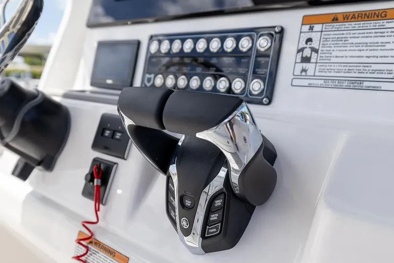  Yacht Photos Pics Control panel of 2026 Sea Fox 288 Commander boat with throttle and warning labels.
