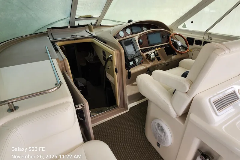 Magnolia Belle Yacht Photos Pics Magnolia Belle helm station showing companionway access to main salon and cabin spaces.