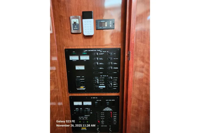 Magnolia Belle Yacht Photos Pics Control panel of a 2004 Sea Ray 390 Motor Yacht with wood finish.