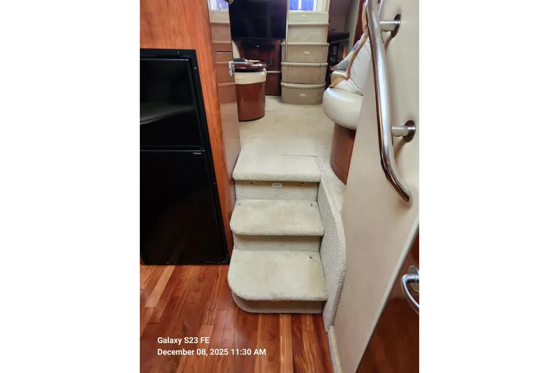 Magnolia Belle Yacht Photos Pics Stairway to galley conceals utility/storage area