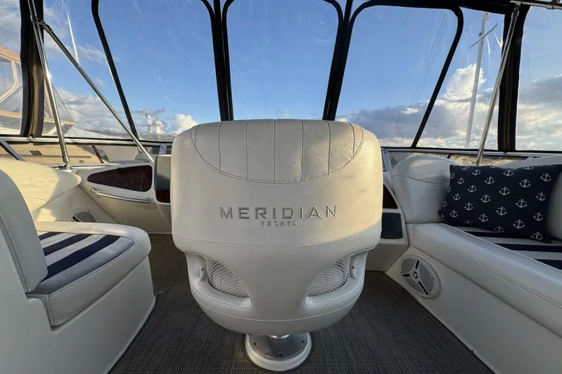 Done Building Yacht Photos Pics Interior of 2008 Meridian 459 Motoryacht with plush seating and nautical decor.