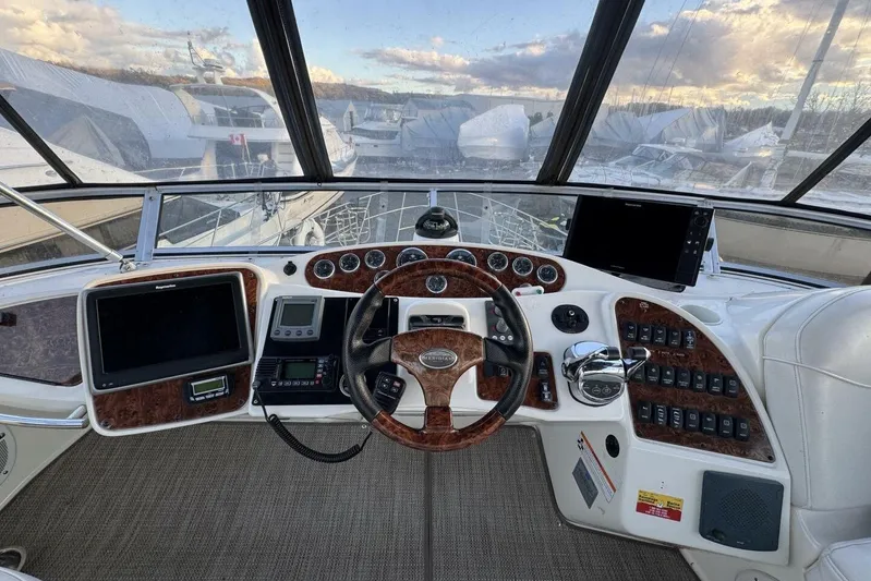 Done Building Yacht Photos Pics 2008 Meridian 459 Motoryacht helm with modern navigation equipment and panoramic view.