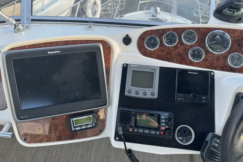 Done Building Yacht Photos Pics Control panel of a 2008 Meridian 459 Motoryacht with navigation and communication equipment.