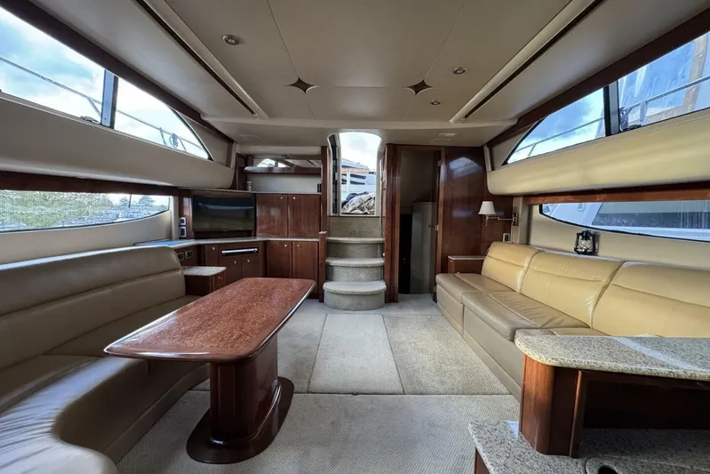 Done Building Yacht Photos Pics Luxurious interior of 2008 Meridian 459 Motoryacht with elegant seating and wood finishes.