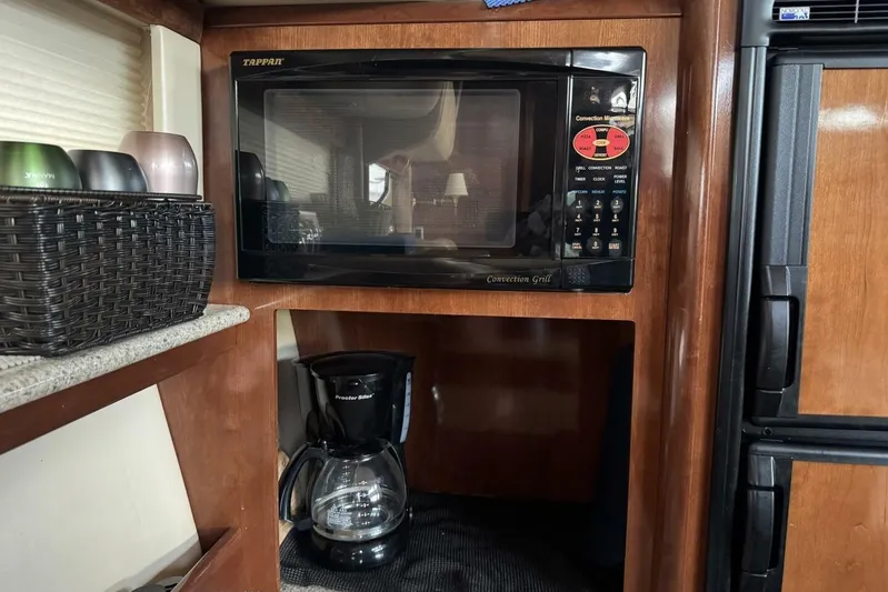Done Building Yacht Photos Pics Microwave and coffee maker in 2008 Meridian 459 Motoryacht kitchen.