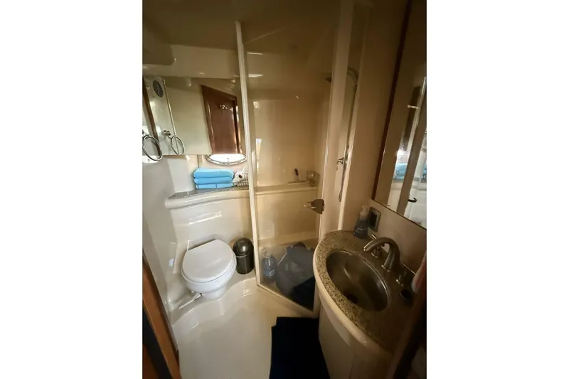 Done Building Yacht Photos Pics Luxurious bathroom in 2008 Meridian 459 Motoryacht with modern fixtures and elegant design.