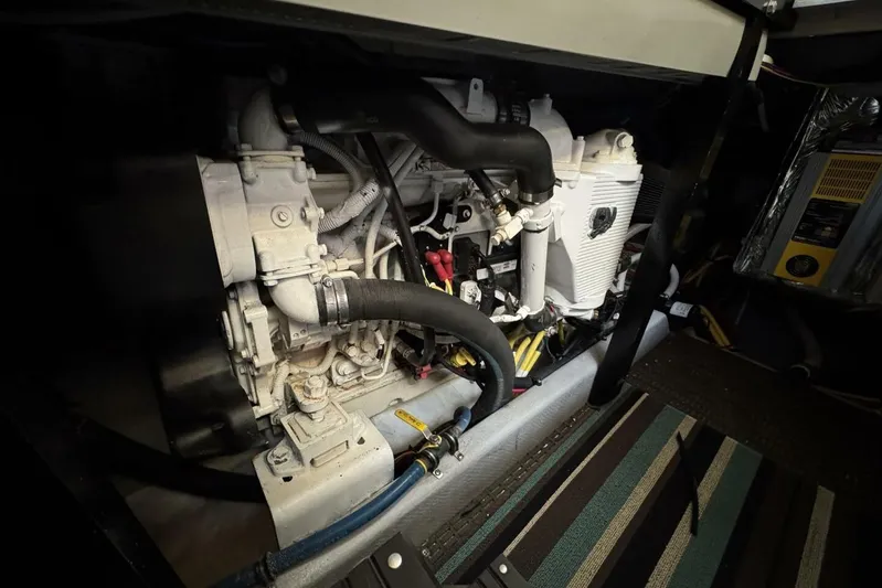 Done Building Yacht Photos Pics Engine compartment of 2008 Meridian 459 Motoryacht, showcasing mechanical components and wiring.