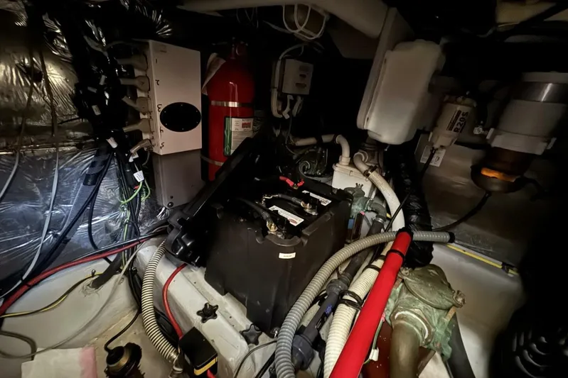 Done Building Yacht Photos Pics Engine room of 2008 Meridian 459 Motoryacht with battery and fire extinguisher.
