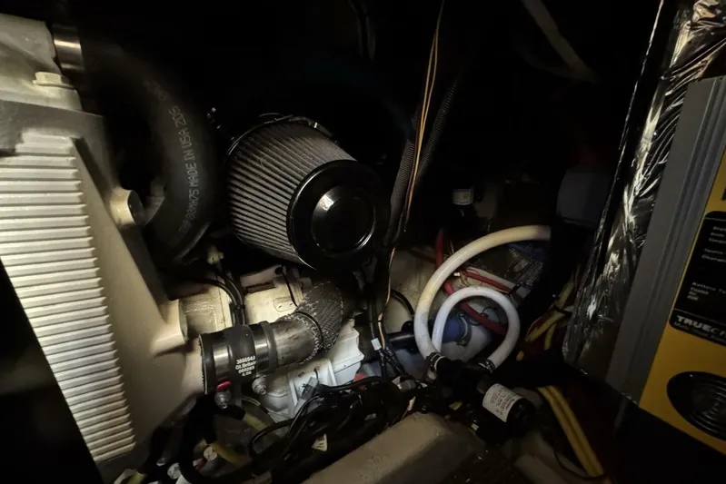 Done Building Yacht Photos Pics Engine compartment of a 2008 Meridian 459 Motoryacht, showcasing mechanical components and wiring.