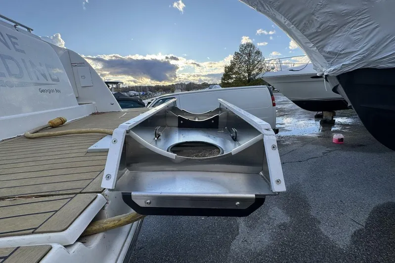 Done Building Yacht Photos Pics 2008 Meridian 459 Motoryacht with extended platform, docked under a cloudy sky.