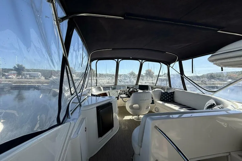 Done Building Yacht Photos Pics 2008 Meridian 459 Motoryacht interior with helm, seating, and panoramic windows.