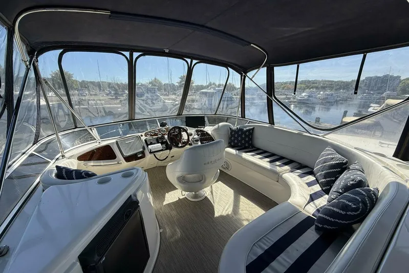 Done Building Yacht Photos Pics Luxurious 2008 Meridian 459 Motoryacht interior with plush seating and panoramic windows.