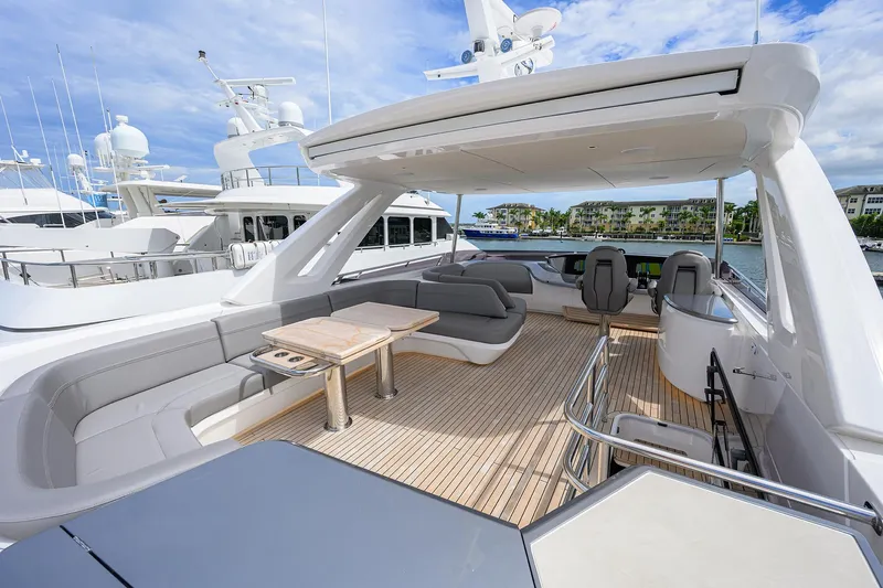  Yacht Photos Pics Luxurious 2026 Princess S72 yacht deck with elegant seating and modern design.