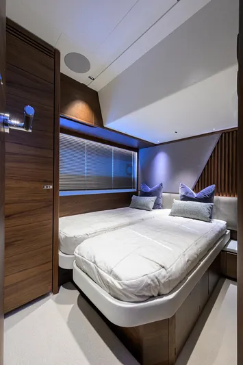  Yacht Photos Pics Luxurious cabin interior of 2026 Princess S72 yacht with twin beds and modern decor.