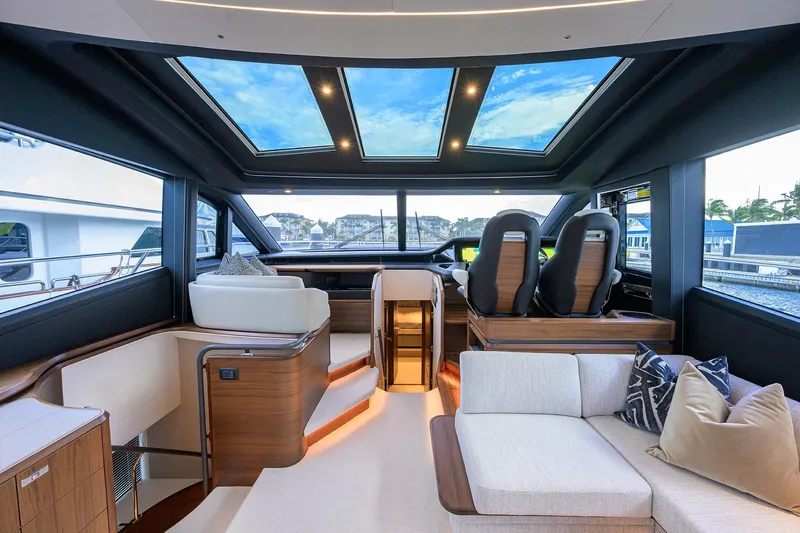  Yacht Photos Pics Luxurious interior of 2026 Princess S72 yacht with panoramic windows and modern seating.