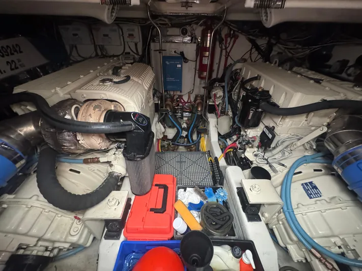  Yacht Photos Pics Engine room of a 2006 Tiara Yachts 4200 Open, showcasing dual engines and equipment.
