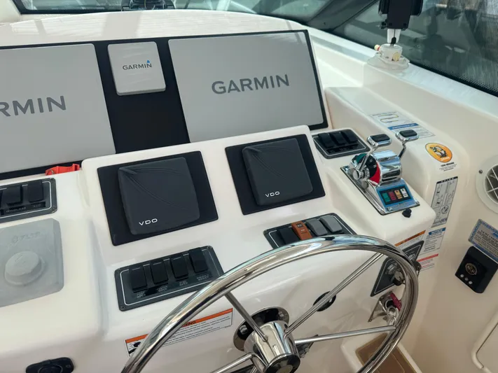  Yacht Photos Pics Control panel of a 2006 Tiara Yachts 4200 Open with Garmin navigation system.