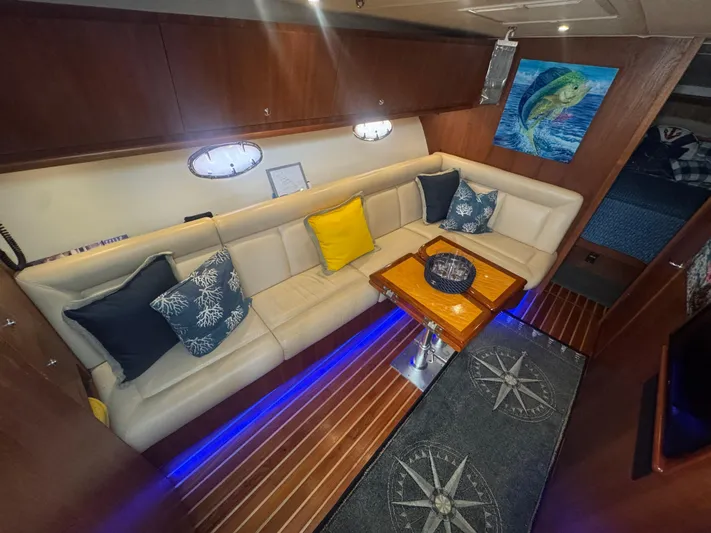  Yacht Photos Pics Luxurious 2006 Tiara Yachts 4200 Open interior with plush seating and elegant decor.