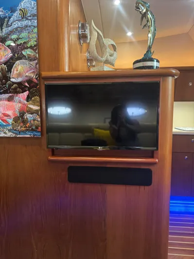  Yacht Photos Pics Interior of 2006 Tiara Yachts 4200 Open with TV and marine decor.