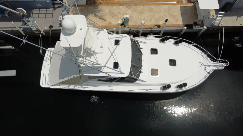  Yacht Photos Pics Aerial view of 2006 Tiara Yachts 4200 Open docked at marina.
