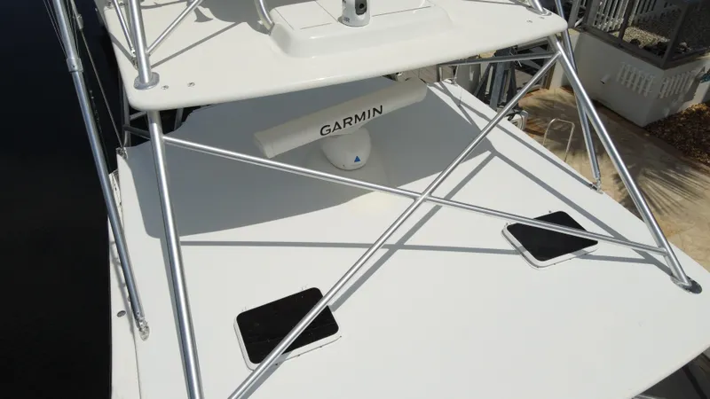  Yacht Photos Pics 2006 Tiara Yachts 4200 Open with Garmin radar, featuring sleek design and sturdy structure.