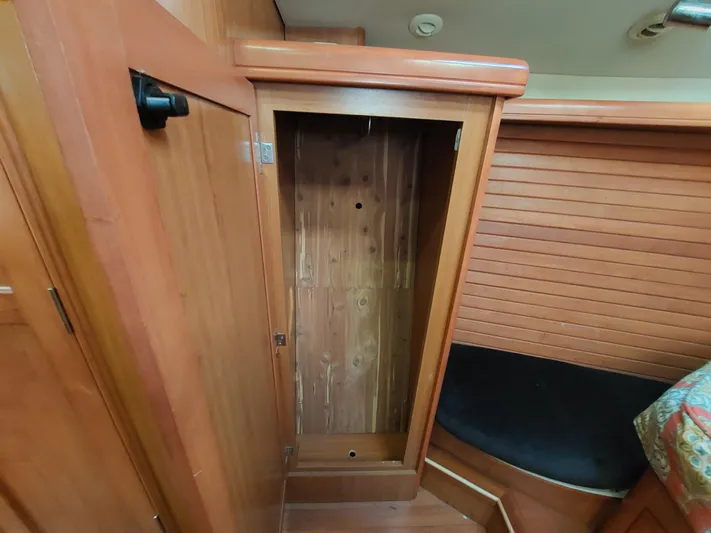 "heron" Yacht Photos Pics Empty wooden closet in 2009 Hunter 49 boat interior.