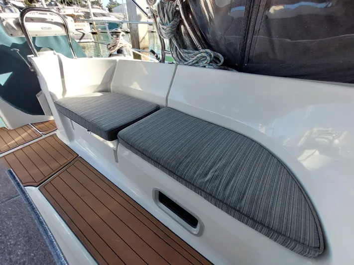 "heron" Yacht Photos Pics Hunter 49 sailboat cockpit seating with gray cushions, 2009 model.