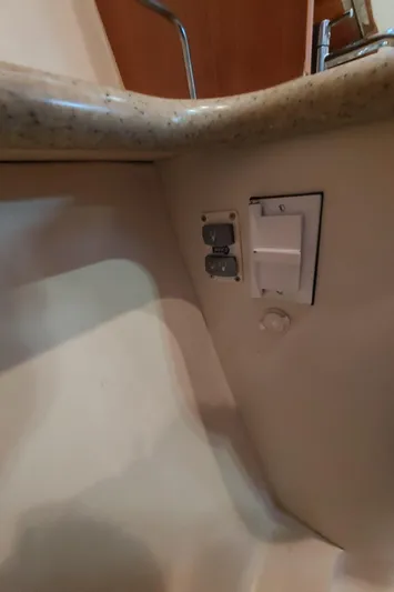 "heron" Yacht Photos Pics Electrical outlet and switch under countertop in 2009 Hunter 49 boat.