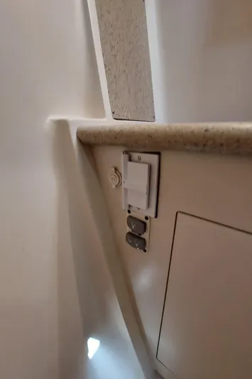 "heron" Yacht Photos Pics Interior detail of a 2009 Hunter 49 yacht, featuring electrical outlets and cabinetry.