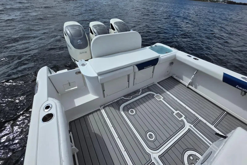 Paradise Bound Yacht Photos Pics 2008 Everglades 350LX boat with triple engines on calm water.