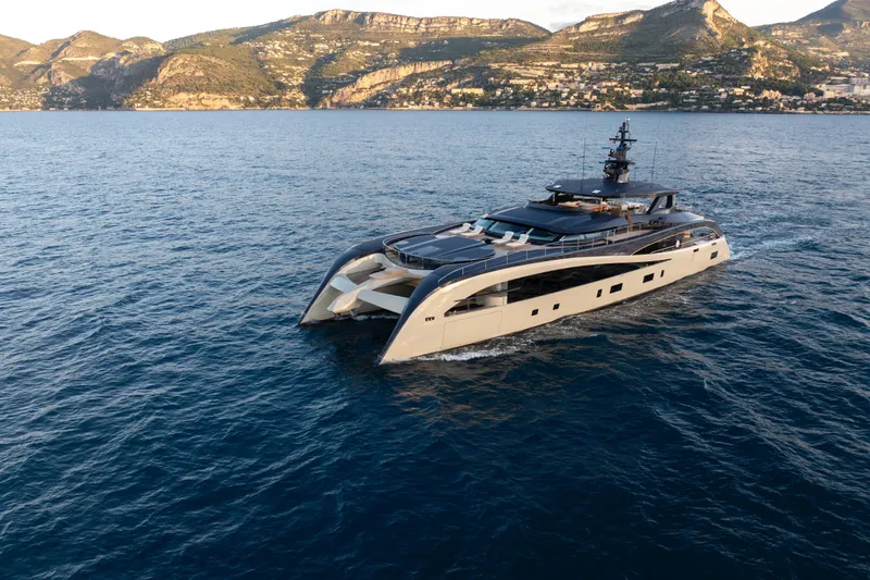 Seawolf X Yacht Photos Pics Luxurious 2024 Rossinavi SEACAT 40 yacht cruising on serene waters with scenic mountain backdrop.