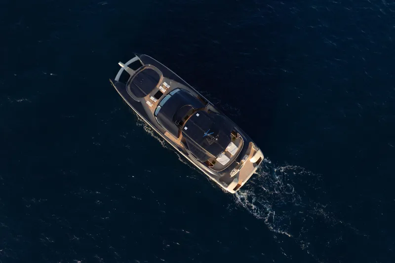 Seawolf X Yacht Photos Pics Aerial view of 2024 Rossinavi SEACAT 40 yacht cruising on open water.