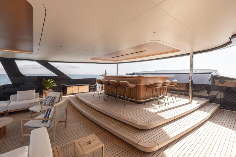 Seawolf X Yacht Photos Pics Luxurious 2024 Rossinavi SEACAT 40 yacht deck with elegant seating and bar area.