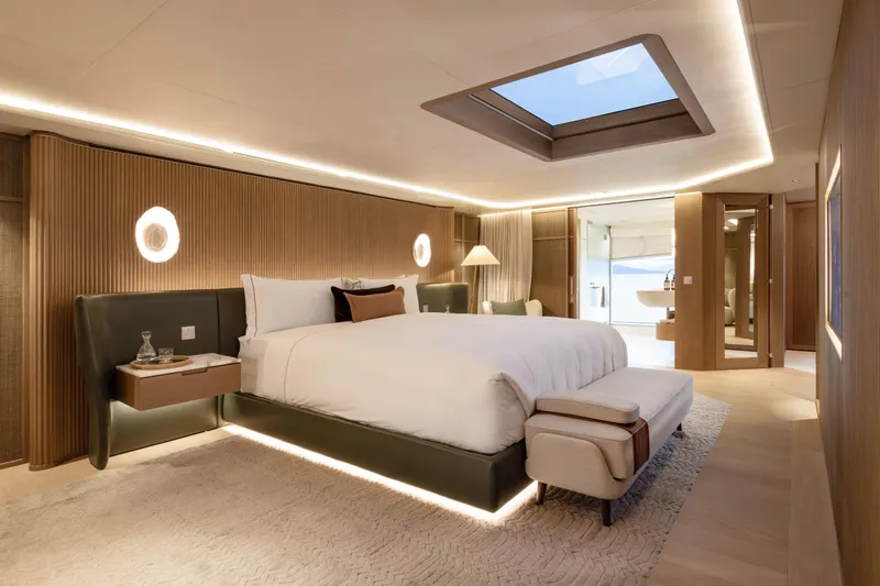 Seawolf X Yacht Photos Pics Luxurious bedroom interior of 2024 Rossinavi SEACAT 40 yacht with skylight and modern decor.