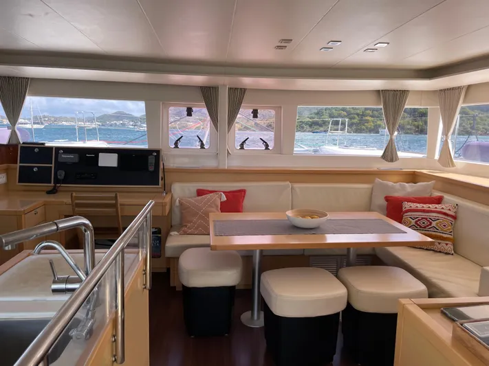 Pasha Yacht Photos Pics Luxurious interior of 2012 Lagoon 450F catamaran with spacious seating and scenic ocean views.