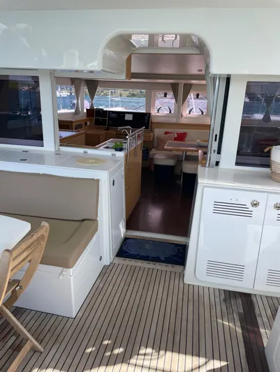 Pasha Yacht Photos Pics Interior of 2012 Lagoon 450F catamaran, featuring spacious seating and modern design.