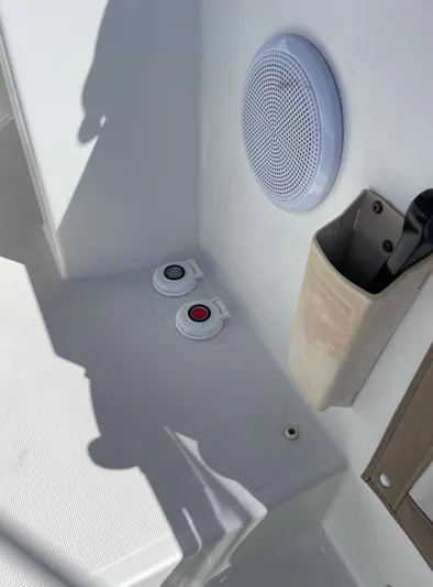 Pasha Yacht Photos Pics Boat deck with speaker, hose holder, and water access on a 2012 Lagoon 450F.