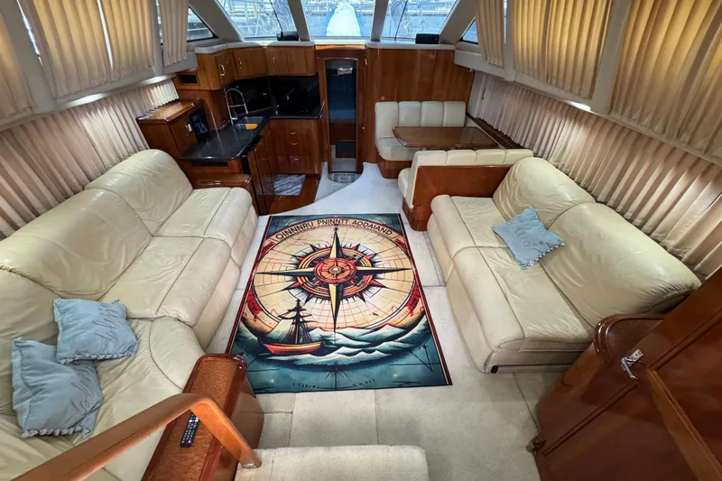 Yacht Photos Pics Luxurious interior of 2004 Carver 444 Cockpit Motor Yacht with plush seating and nautical decor.