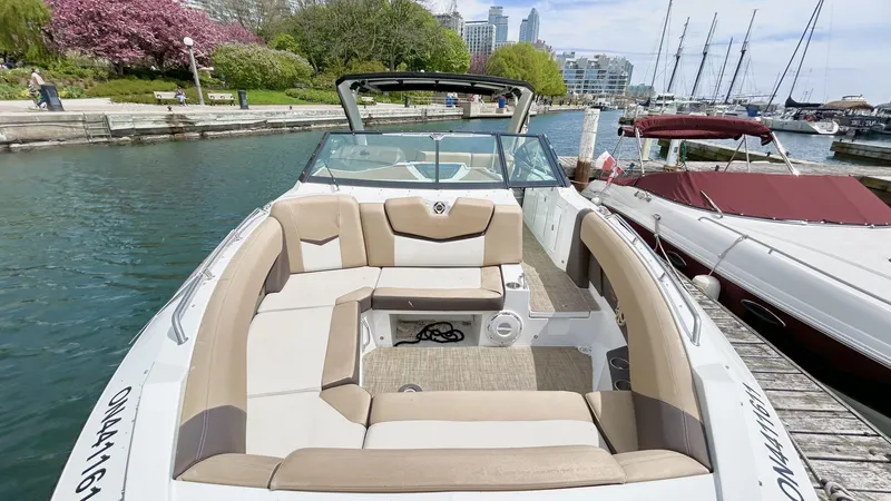  Yacht Photos Pics 2014 Cruisers Sport Series 328 Bow Rider docked in a scenic marina setting.