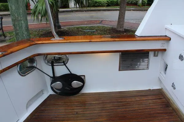  Yacht Photos Pics 1983 Cheoy Lee 90 cockpit motor yacht with teak deck and polished wood railing.