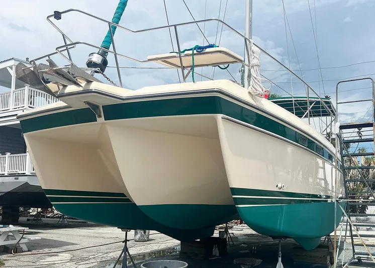  Yacht Photos Pics 1998 Island Packet Cat 35 catamaran on dry dock, showcasing its dual hull design.