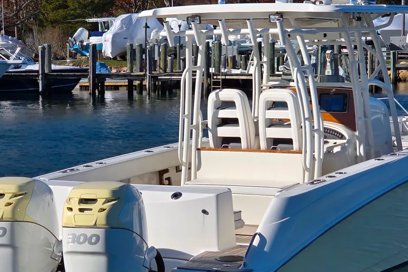  Yacht Photos Pics 2013 Boston Whaler 320 Outrage boat docked with dual 300 engines.
