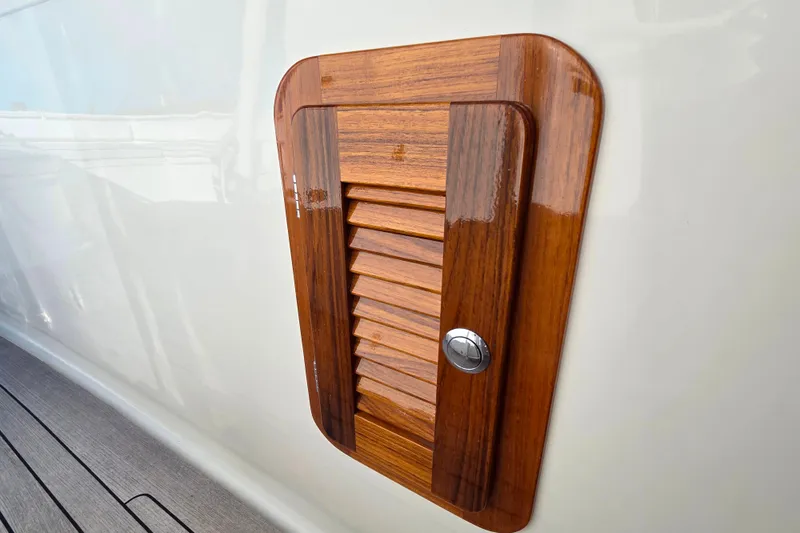  Yacht Photos Pics Wooden hatch detail on 2013 Boston Whaler 320 Outrage boat.