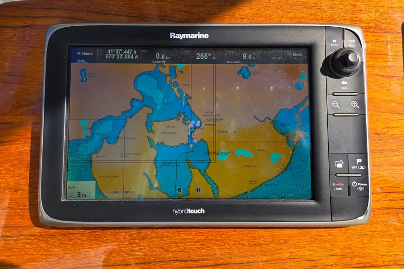  Yacht Photos Pics Raymarine GPS display on 2013 Boston Whaler 320 Outrage boat dashboard.