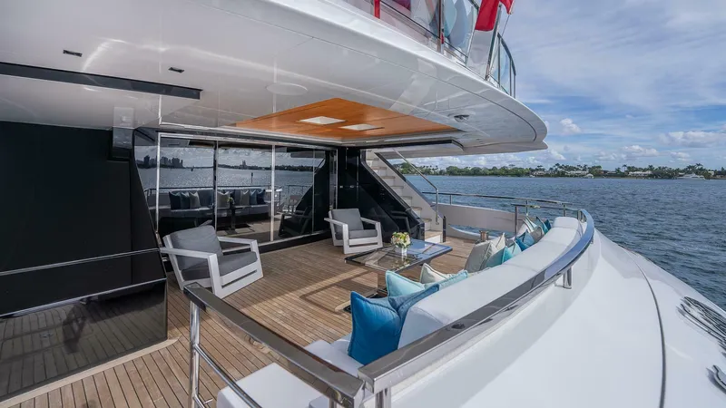 Neverland Yacht Photos Pics Luxurious 2016 Mangusta Oceano 42 yacht deck with elegant seating and ocean view.
